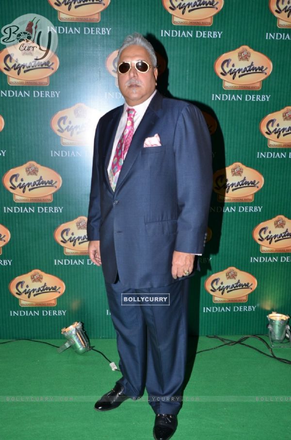 Vijay Mallya poses for the media at Signature Derby 2015