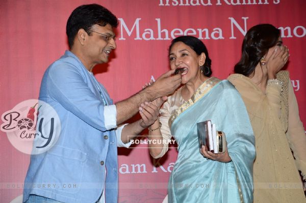 Irshad Kamil was snapped feeding a piece of cake to Deepti Naval at the Book Launch