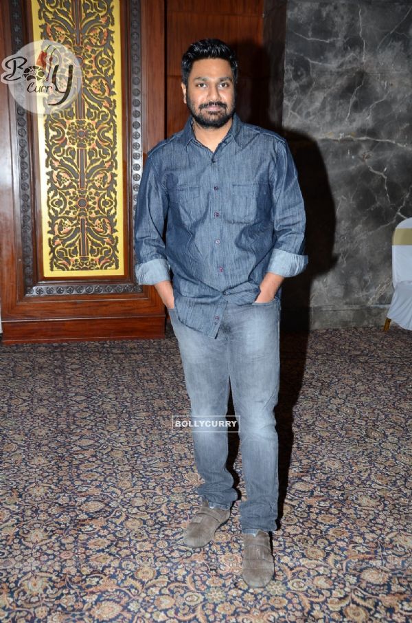 Mithoon poses for the media at Irshad Kamil's Book Launch