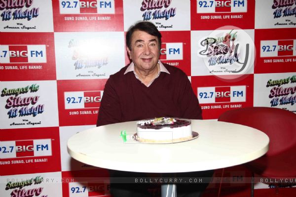 Randhir Kapoor poses with his Birthday Cake at his Birthday Celebrations at 92.7 BIG FM