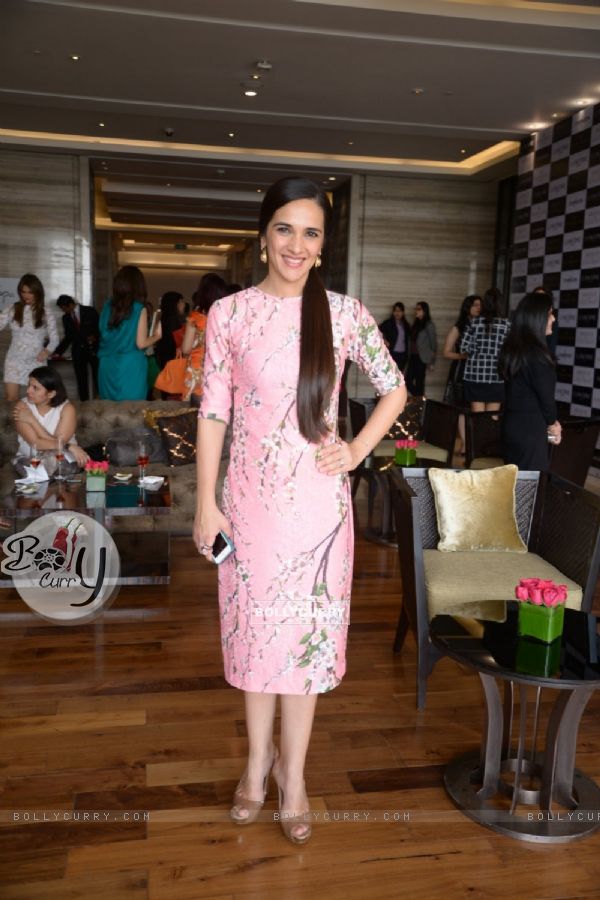 Tara Sharma poses for the media at Lancome Promotional Event