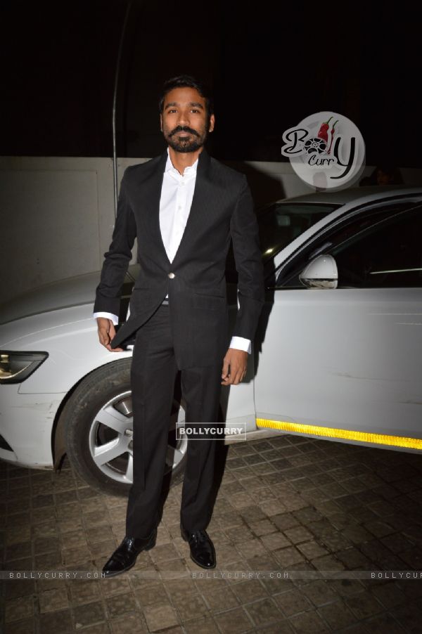 Dhanush poses for the media at the Special Screening of Shamitabh