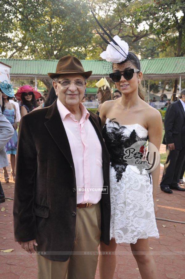 Cyrus Poonawala and Natasha Poonawala pose for the media at The Hello! Classic Cup 2015