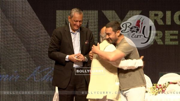Aamir Khan greets a guest at YFG Event