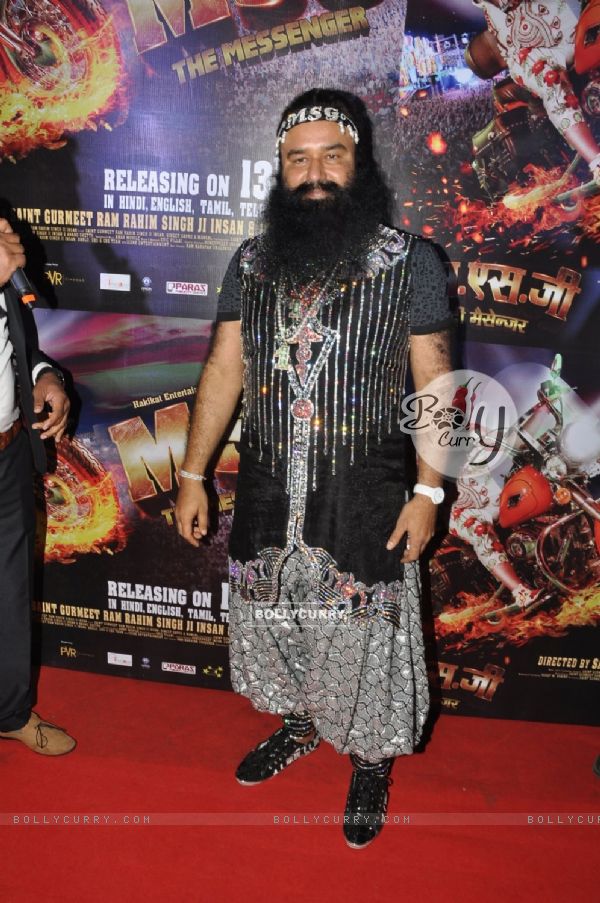 Gurmeet Ram Rahim Singh poses for the media at the Premier of MSG: The Messenger of God