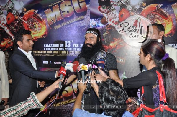 Gurmeet Ram Rahim Singh gives media bytes at the Premier of MSG: The Messenger of God