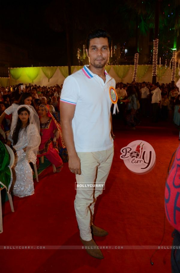 Randeep Hooda poses for the media at the Annual Day of Children's Welfare Centre High School