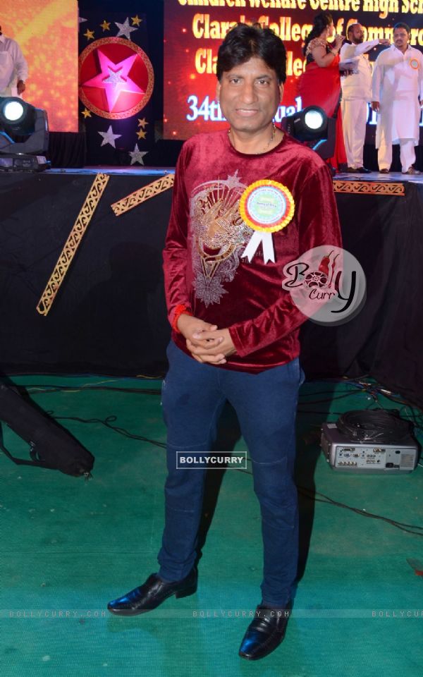 Raju Shrivastav poses for the media at the Annual Day of Children's Welfare Centre High School
