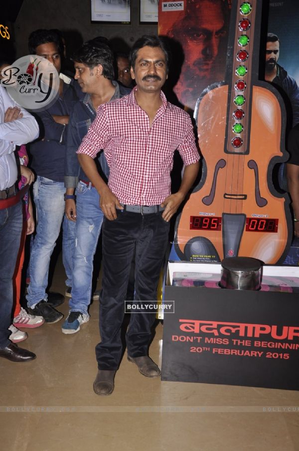 Nawazuddin Siddiqui poses for the media at the Promotions of Badlapur