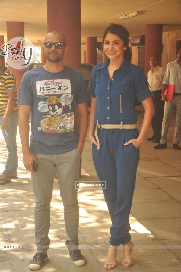 Anushka Sharma and Neil Bhoopalam pose for the media at the Promotions of NH10 at Red FM