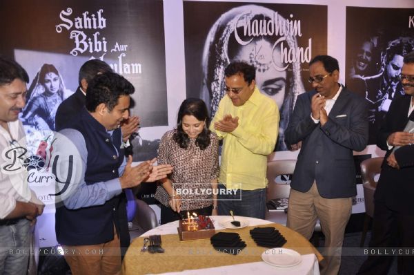 Anupama Chopra cuts a cake at Dinesh Raheja and Jeetendra Kothari's Book Launch