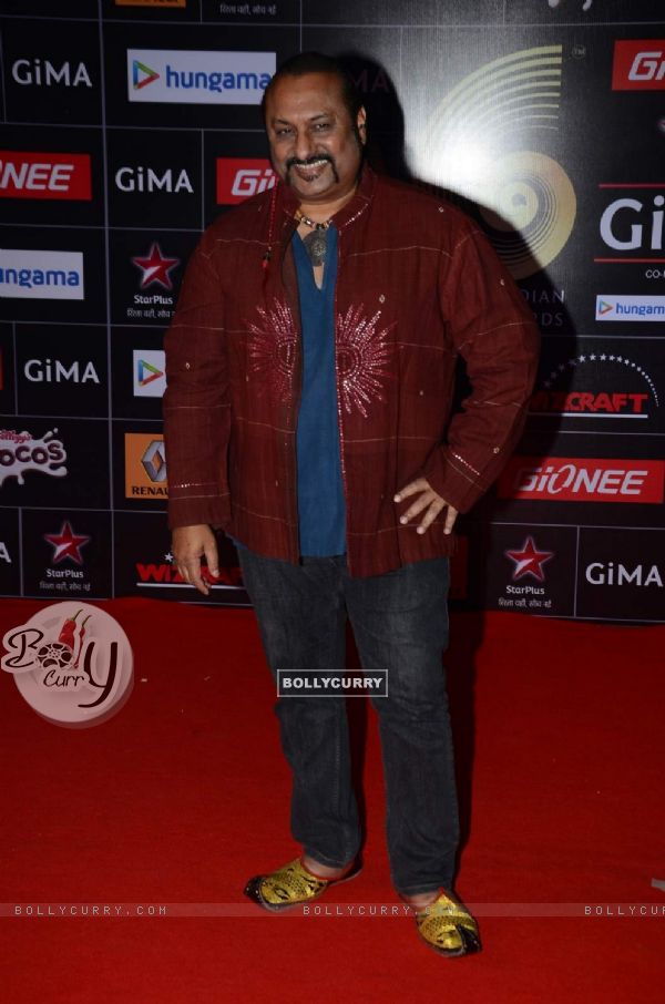 Leslie Lewis poses for the media at GIMA Awards 2015