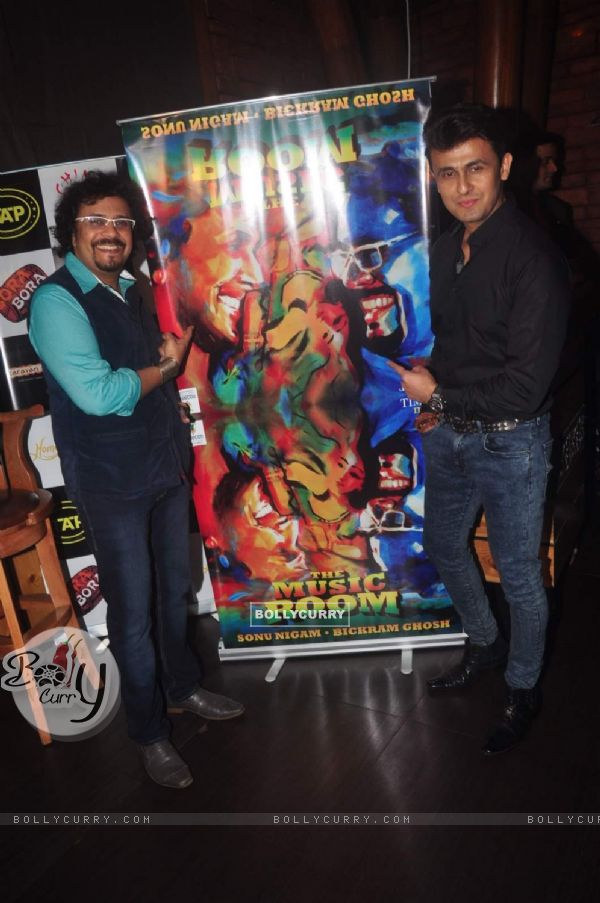 Sonu Nigam and Bickram Ghosh pose for the media at their Album Launch