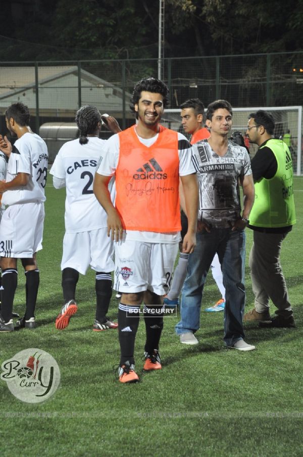 Arjun Kapoor poses for the media at All Stars Football Match