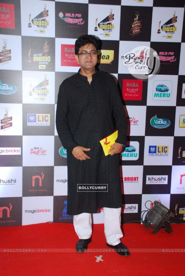 Prasoon Joshi poses for the media at Radio Mirchi Awards