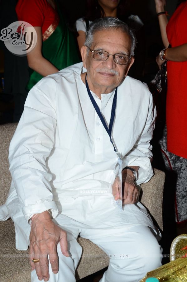 Gulzar smiles for the camera at the Launch of Gulzar Pluto Poems Book