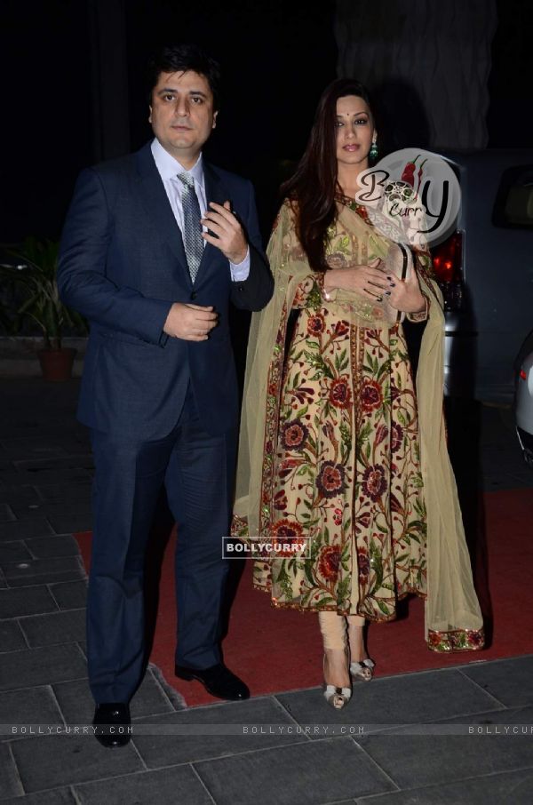 Goldie Behl and Sonali Bendre pose for the media at Tulsi Kumar's Wedding Reception