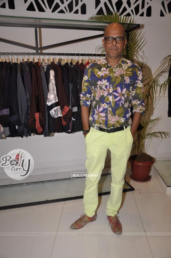 Narendra Kumar poses for the media at his Store Launch