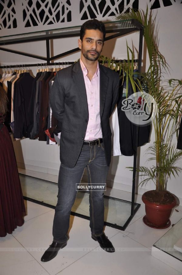 Angad Bedi poses for the media at Narendra Kumar's Store Launch