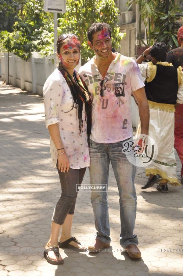 Anup Soni and Juhi Babbar pose for the media at Shabana Azmi's Holi Bash