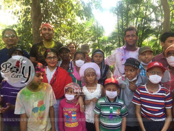 Sandip Soparkar poses with Cancer Patient Children