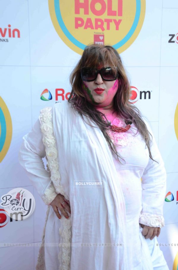 Dolly Bindra poses for the media at Zoom Holi Bash