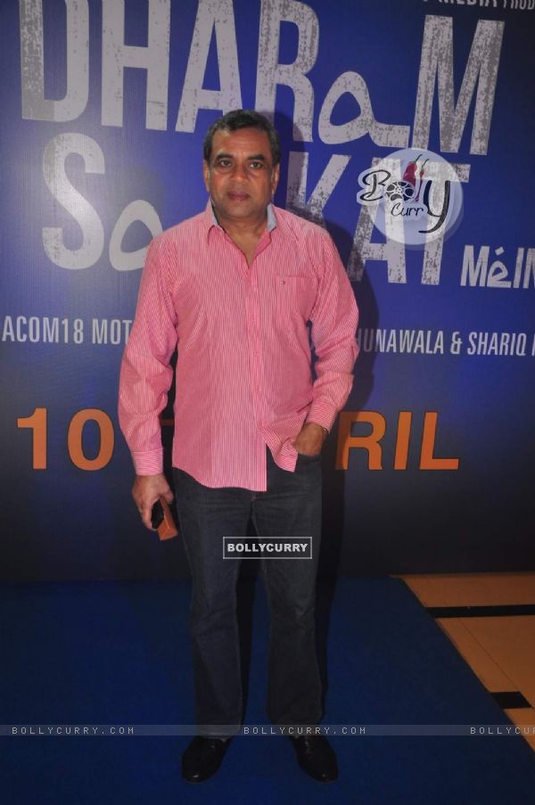 Paresh Rawal poses for the media at the Trailer Launch of Dharam Sankat Mein