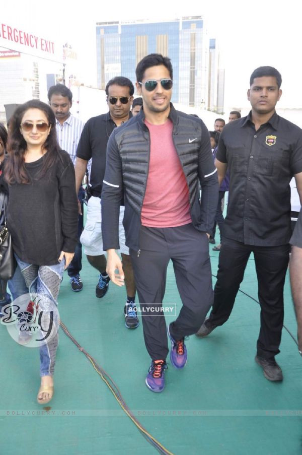 Sidharth Malhotra poses for the media at DNA Race