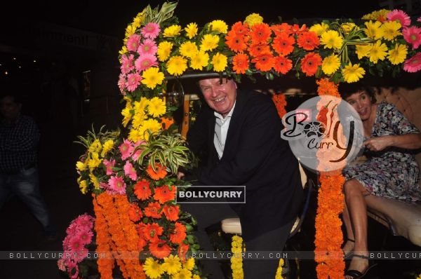 Celebs arrive in a decorated auto at the Special Screening of The Second Best Marigold Hotel