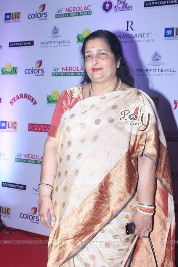 Anuradha Paudwal poses for the media at Smile Foundation Charity Fashion Show