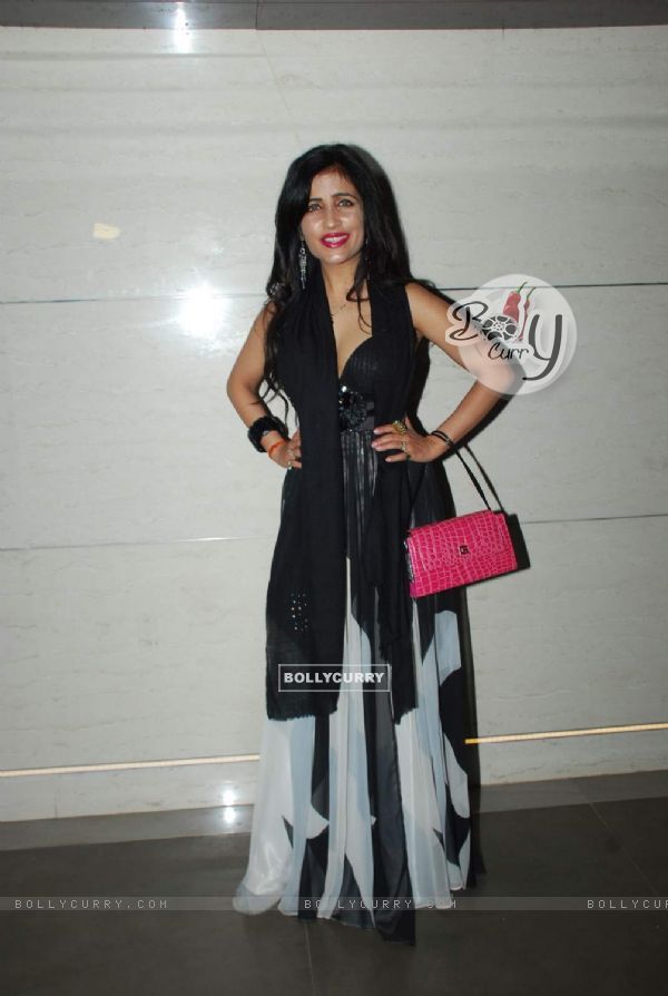 Shibani Kashyap poses  for the media at the Launch of Harry's Bar & Cafe