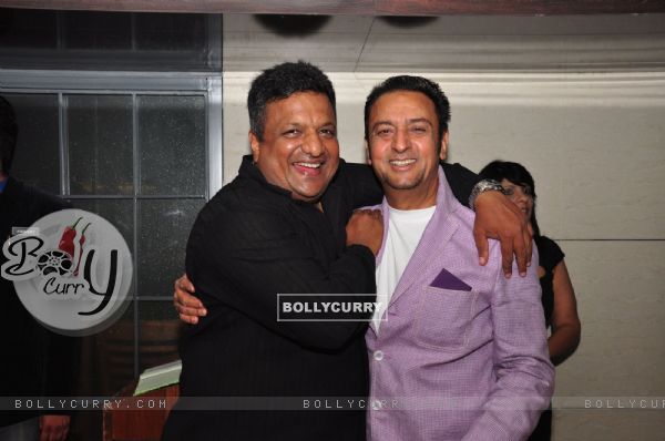Gulshan Grover and Sanjay Gupta pose for the media at the Launch of Harry's Bar & Cafe