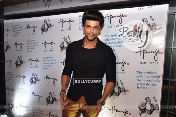 Kushal Tandon poses for the media at the Launch of Harry's Bar & Cafe