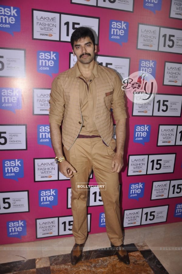 Nikitin Dheer poses for the media at the Grand Finale of Lakme Fashion Week 2015