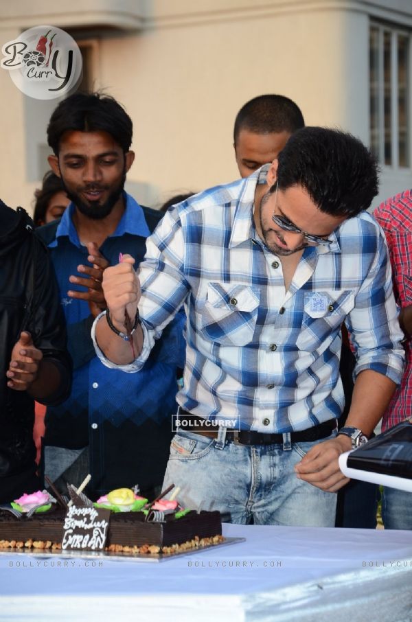 Emraan Hashmi cuts his Birthday cake with the Media