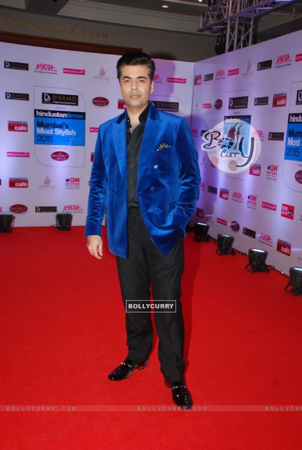 Karan Johar poses for the media at HT Style Awards 2015