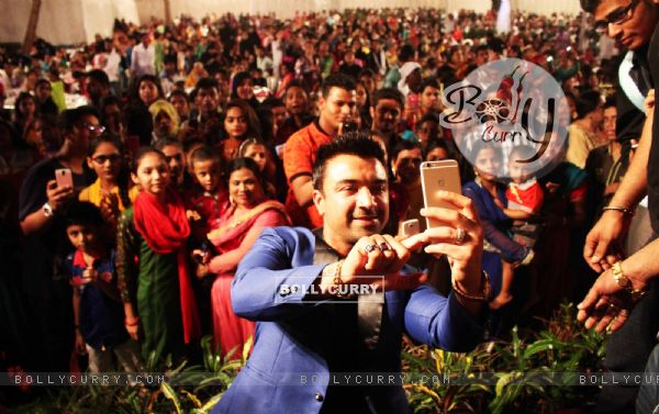 Ajaz Khan clecks a selfie with his fans at a Mass Marriage Initiative