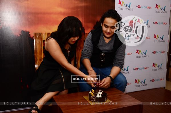 Faisal Khan cuts a cake at Book Signing Event