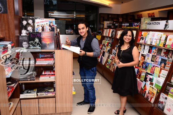 Faisal Khan poses for the media at Book Signing Event