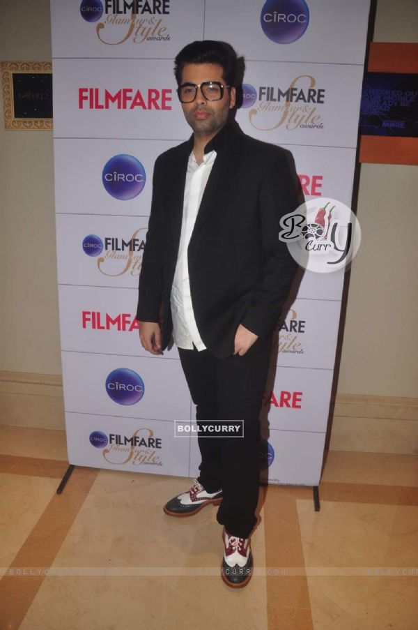 Karan Johar poses for the media at the Cover Launch of Ciroc Filmfare Glamour & Style Awards Issue