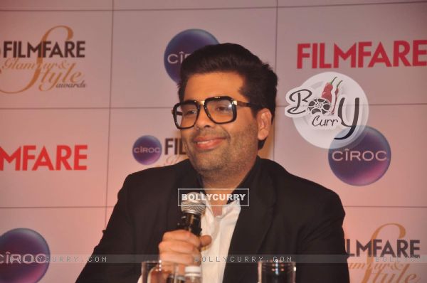 Karan Johar interacts with the audience at the Cover Launch of Ciroc Filmfare Glamour & Style Awards