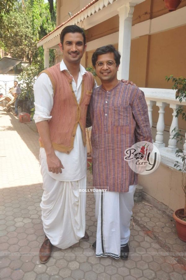 Sushant Singh Rajput and Anand Tiwari pose for the media at the Promotions
