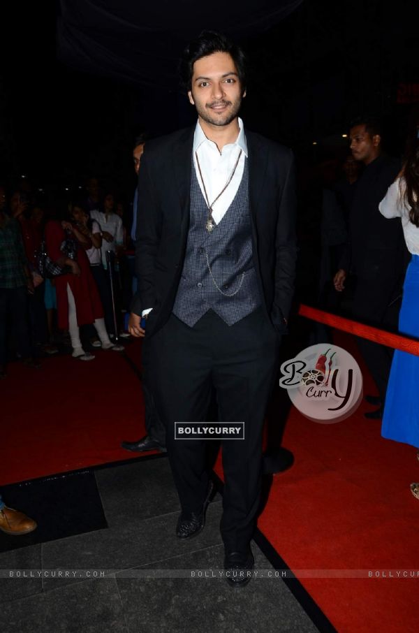 Ali Fazal poses for the media at the Premier of Fast & Furious 7