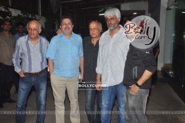 The Bhatts pose with a friend at the Special Screening of Detective Byomkesh Bakshy! (360783)