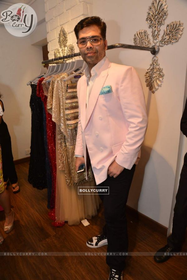 Karan Johar poses for media at Avinash Punjabi Store Launch