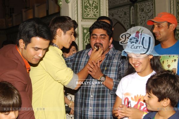 Rohan Mehra feeds a piece of Cake to Rajan Shashi at the Birthday Bash