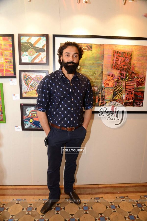 Bobby Deol poses for the media at The Gateway Schools Annual Art Show