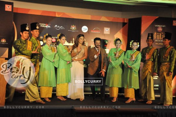 Anil Kapoor and Bipasha Basu poses with performers at IIFA 2015 Press Meet in Malaysia