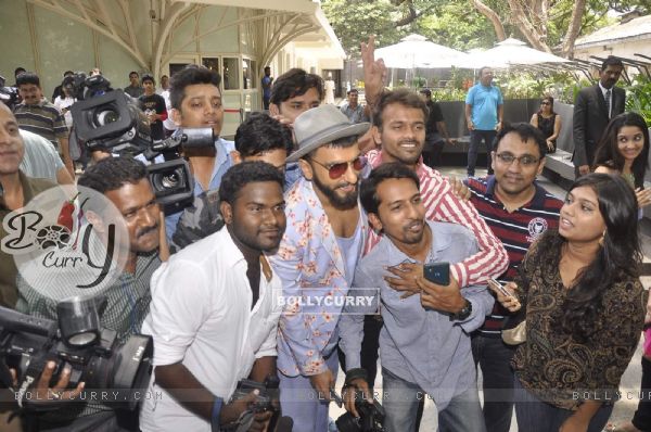 Ranveer Singh poses with media persons at the Music Launch of Dil Dhadakne Do