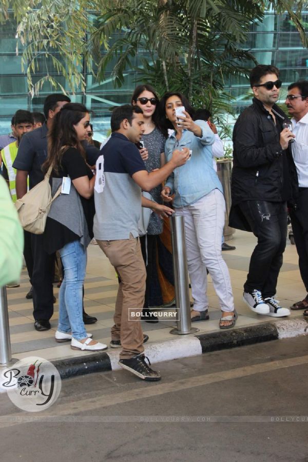 Anushka Sharma Clicks Selfie with Fan at Airport